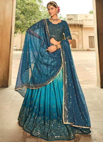 Fancy Choli With Shaded Teal Blue Embroidered Lehenga Choli
